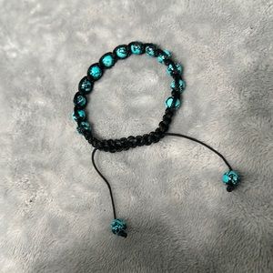 BLACK AND TURQUOISE MACRAME TIE UP BRACELET